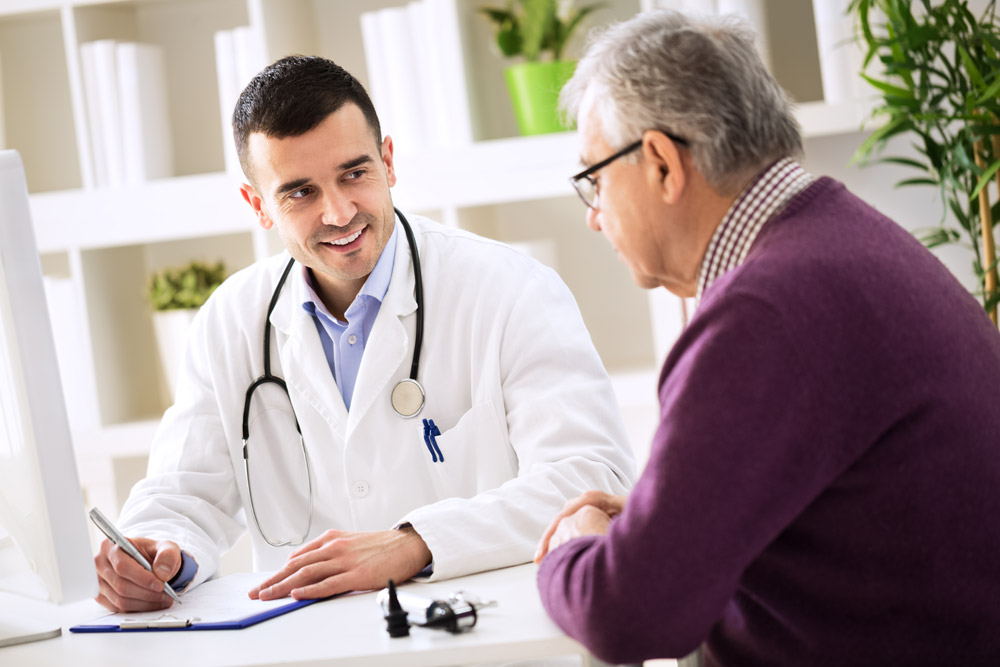 Doctor explaining prescription to patient — trust building in Delhi clinic