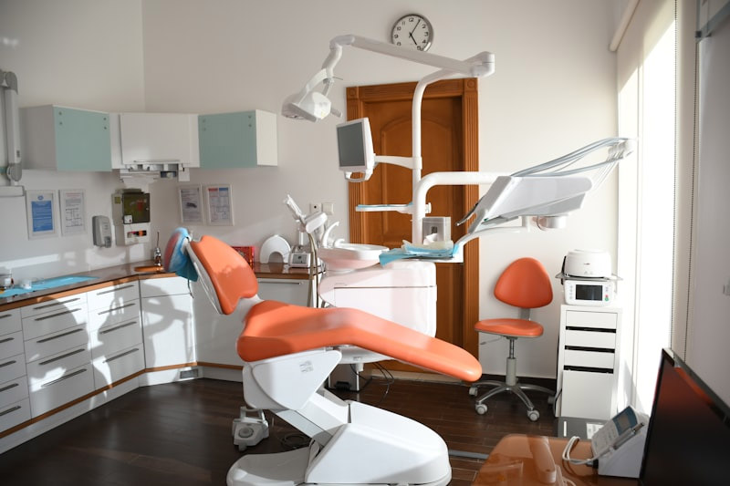 Dentist explaining X-ray to patient — trust building in Delhi clinic